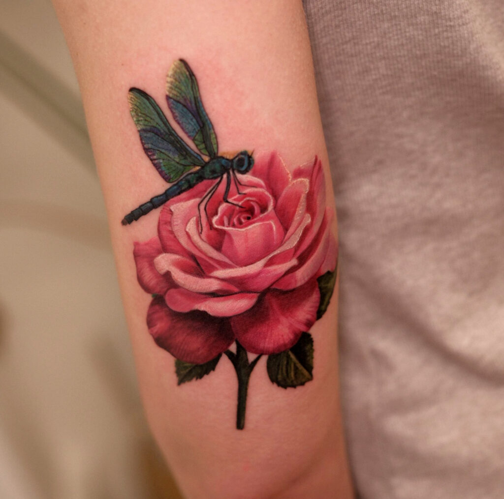 Colour realism rose tattoo with dragonfly